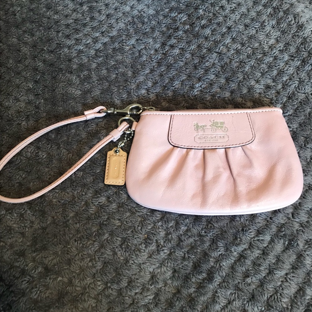 Light pink Coach wristlet